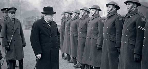 Winston Churchill inspects British troops in 1941.